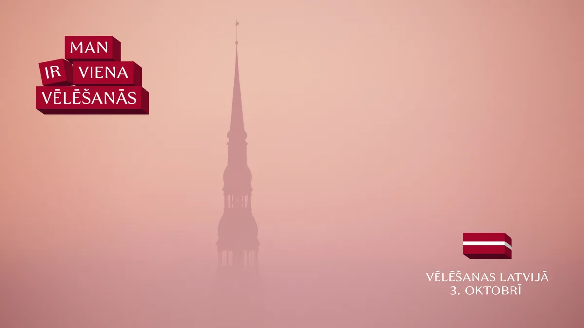 Kampaņas “Man ir viena vēlēšanās” vizuālis — sarkani rotaļu klucīši ar kampaņas nosaukumu, miglā tīts Rīgas Svētā Pētera baznīcas tornis un uzraksts “Vēlēšanas Latvijā 3. oktobrī”